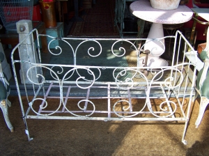 Image of French antique foldup metal cot on castors